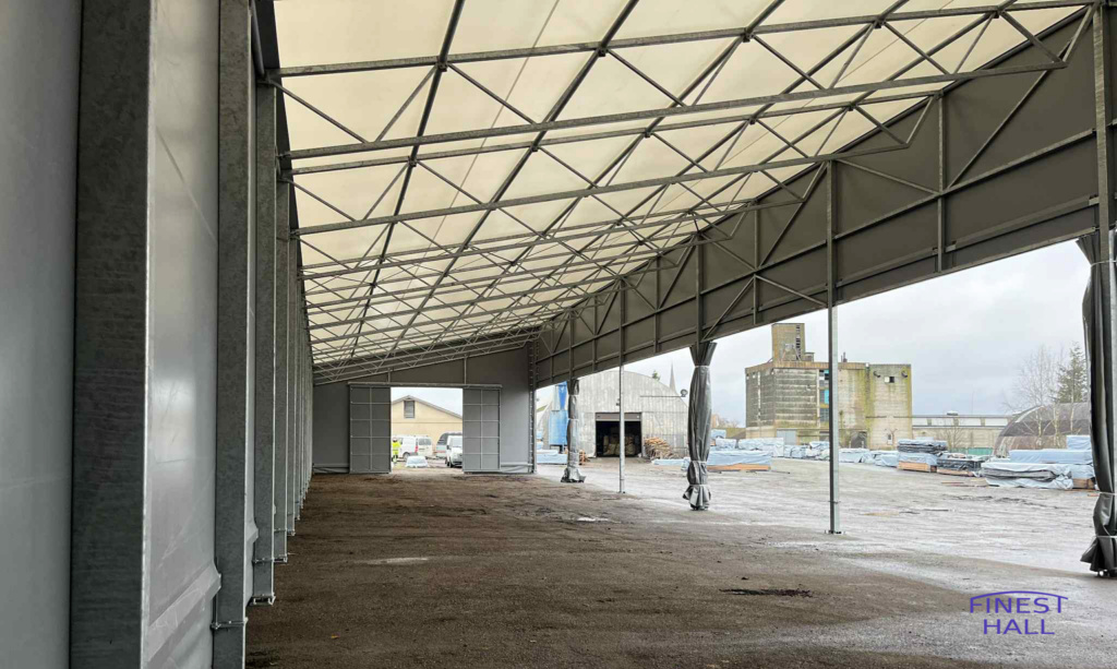 Finest-Hall Factory OÜ toodetud ja paigaldatud varikatus mõõtudega 12x45,5m + 7m, kõrgusega 8 meetrit EK Wood OÜ-le.