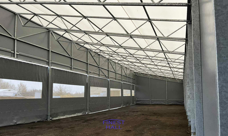 Finest-Hall Factory OÜ toodetud ja paigaldatud varikatus mõõtudega 12x45,5m + 7m, kõrgusega 8 meetrit EK Wood OÜ-le.