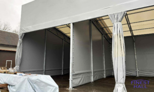 Finest-Hall Factory OÜ toodetud ja paigaldatud varikatus mõõtudega 12x45,5m + 7m, kõrgusega 8 meetrit EK Wood OÜ-le.